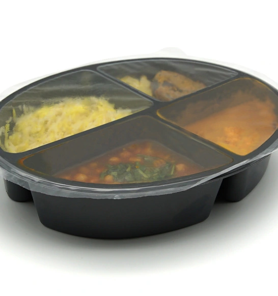 Prepared meal portions beneath clear sealing film; illustrative application example