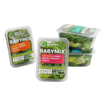 Fresh baby greens in sealed retail trays; illustrative application example