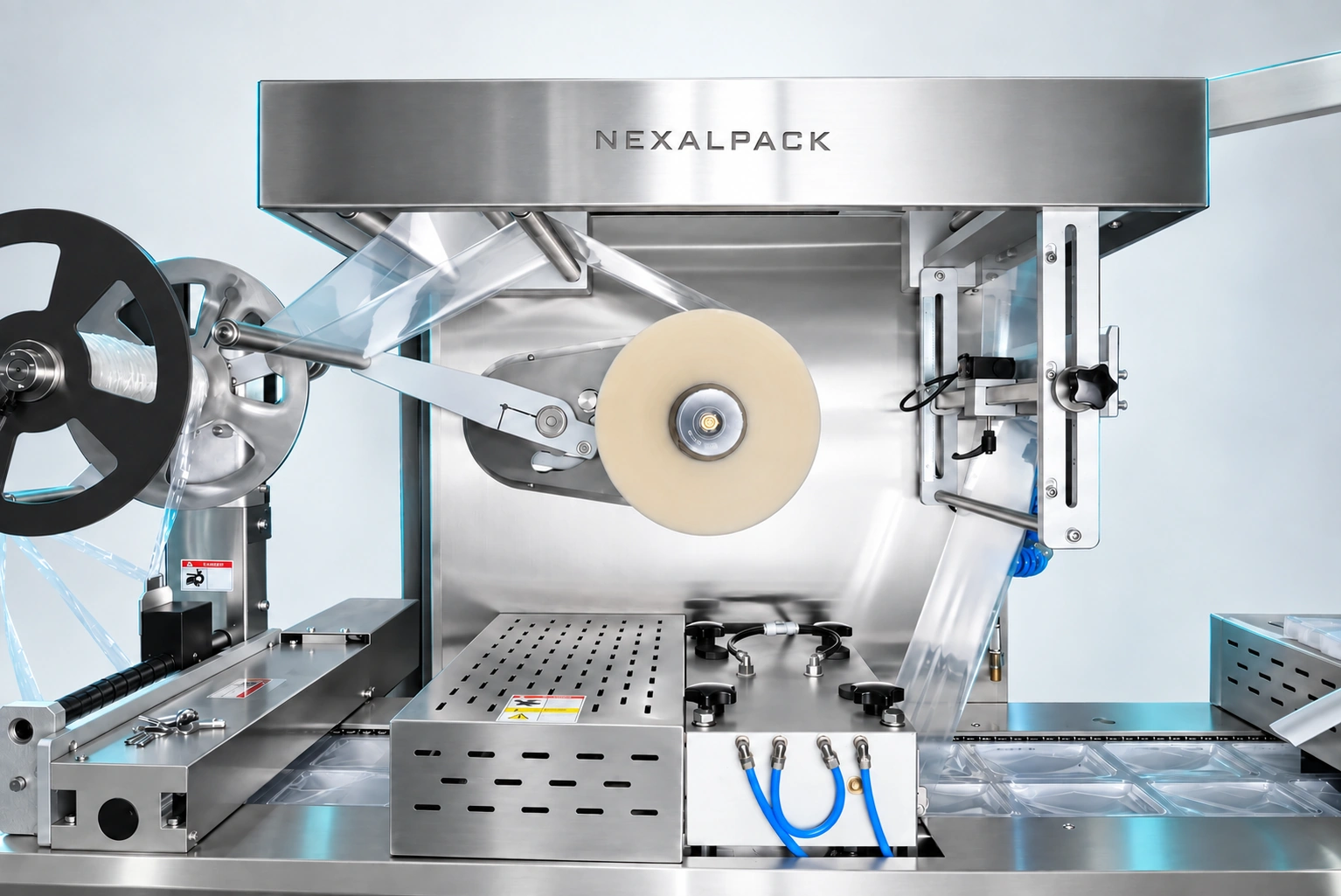 Studio render of NEX-320A(Q) thermoformer: film roll and upper assembly detail